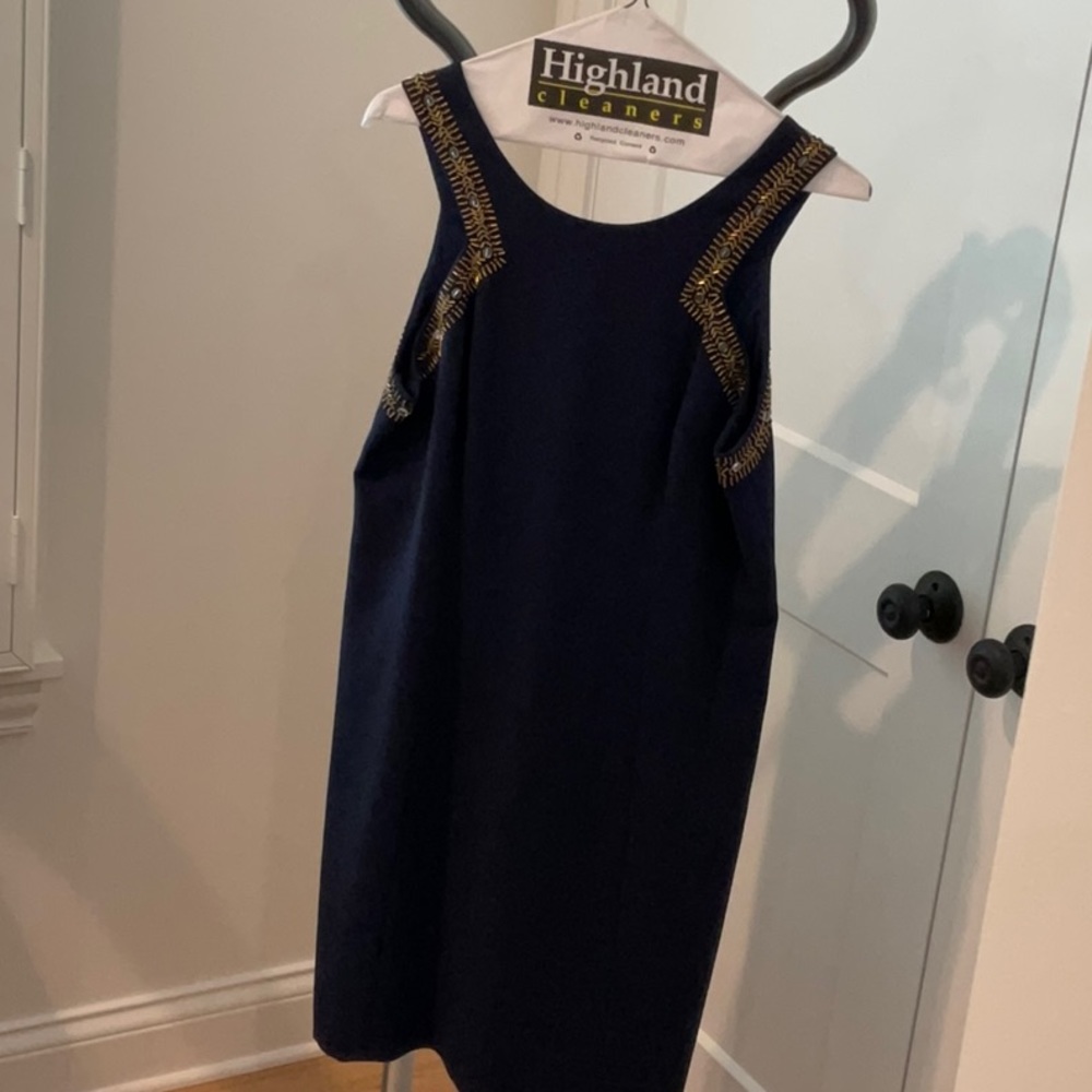 Lilly Pulitzer, size 8.  A-line dress, lined. Navy with embellishments.